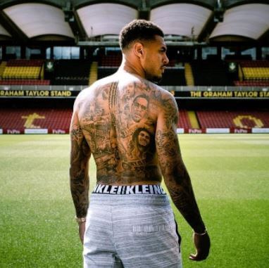 Andre Gray tattoos as a tribute to his heroes.